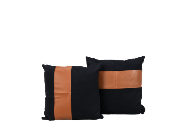 black leather and brown pillows