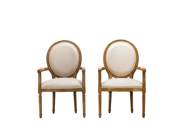 pair of neutral linen side chairs with wood trim