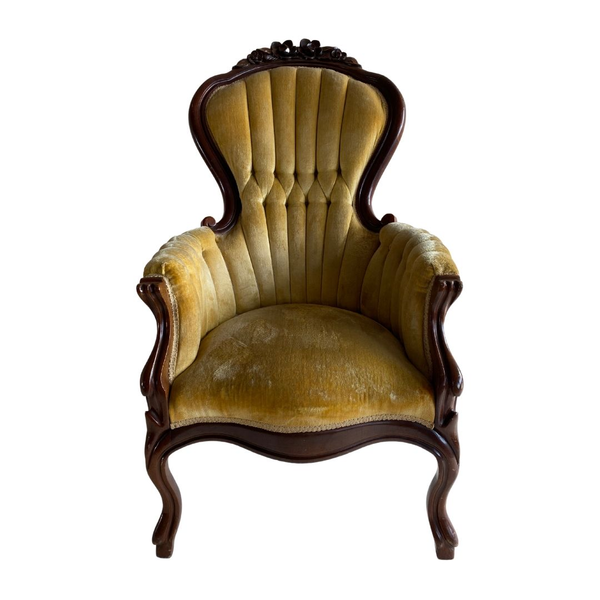 Gold velvet throne with tufted detailing and antique carved wood detailing