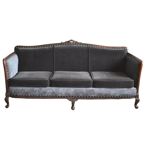 Simple grey velvet sofa that is availble for party rentals and event rentals