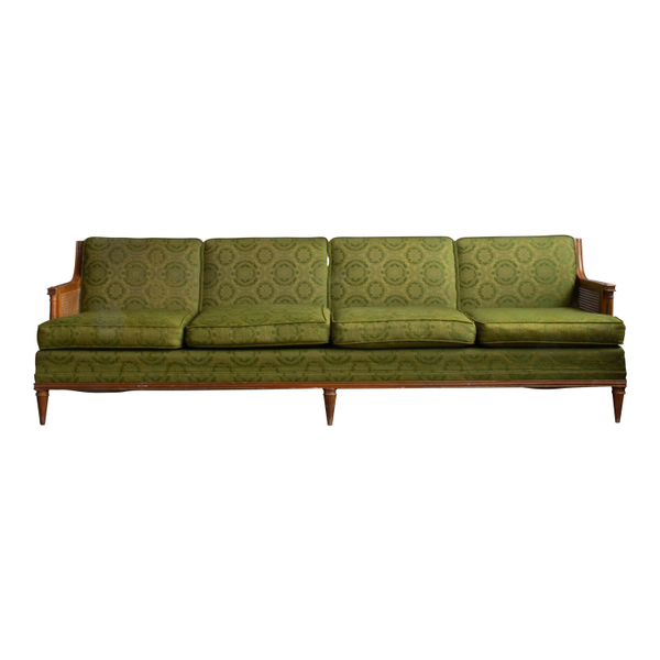 Bright green patterned sofa with straight wood details for rent from Relics Rentals based in Milwaukee