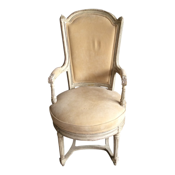 Cream upholstered high back chair that works in a lounge or as a dining chair