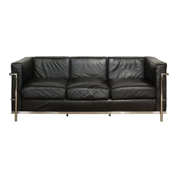 Black leather cube sofa with chrome accents works well in any modern party rental lounge