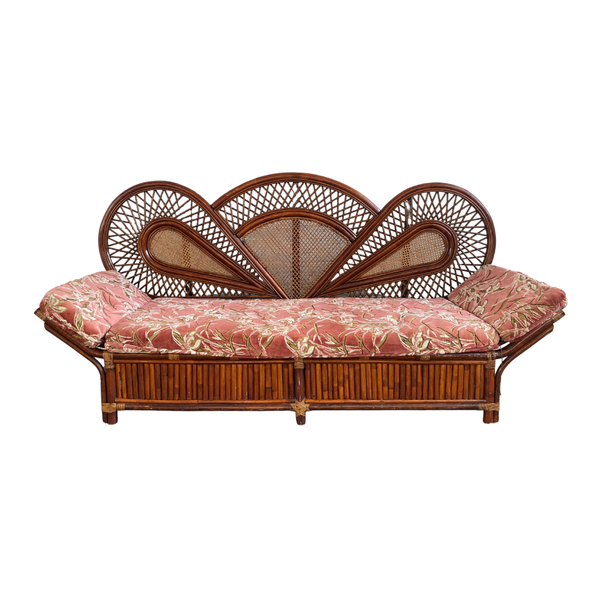 Elaborate peacock shape rattan back sofa with pink velvet upholstered seat for wedding and event rentals