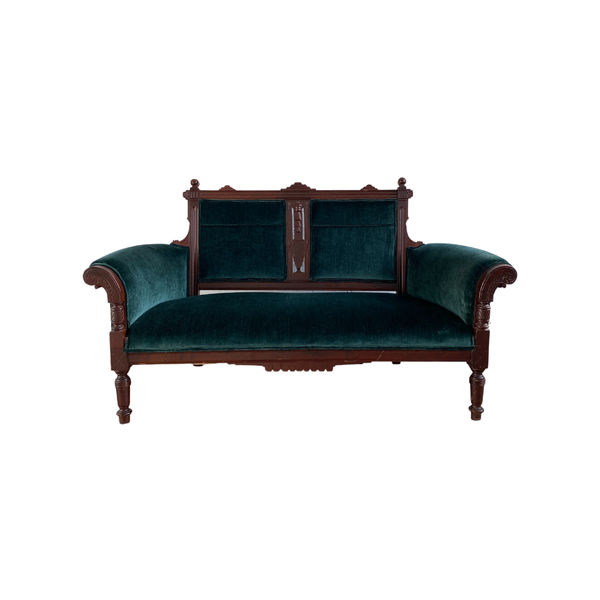 Emerald velvet antique settee with detailed wood work