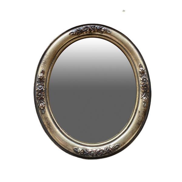 Small, ornate mirror for weddings and events. 
