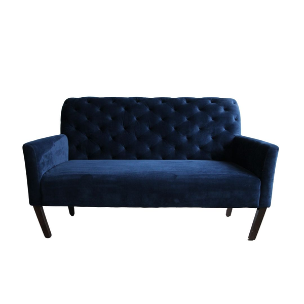 Sapphire blue velvet settee with a tufted back and straight modern lines for rent from Relics Rentals