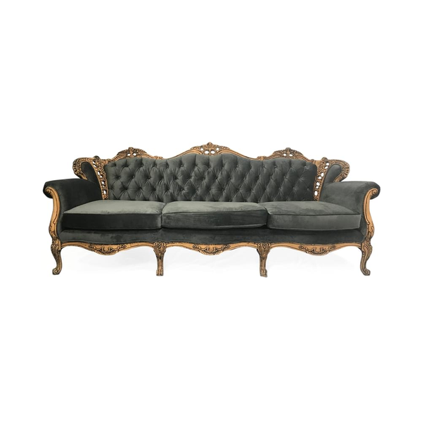 vintage tufted back sofa in a dark gray velvet