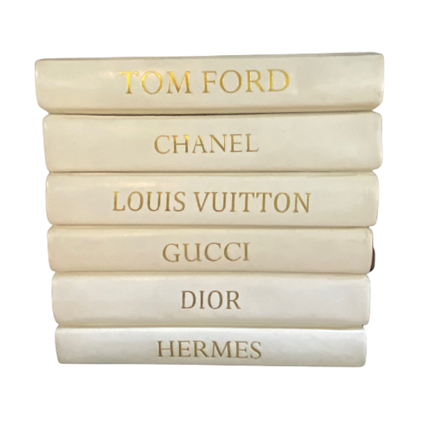 chanel louis vuitton gucci book stack