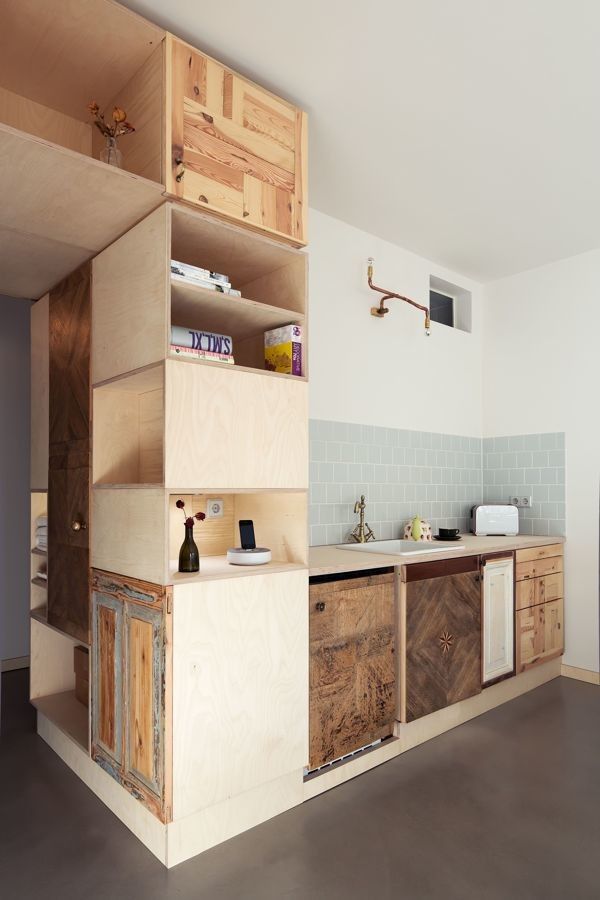 Hotel room with a lot of clever storage solutions and salvaged