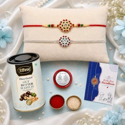 DeoDap Set of 2 Rakhi for Brother - Gold & Silver Colour Flower Design with Choco Coated Butterscotch Chocolate 96gm, Pooja Coin, Roli Chawal & Card | Rakhi with Chocolate Combo for Raksha Bandhan