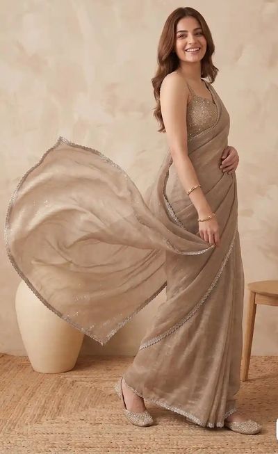 Myntra: Upto 90% off on Kalini & all about you solid embroidered women saree