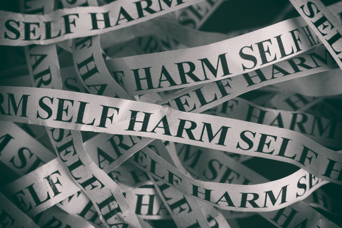 graphic of ribbons saying self harm