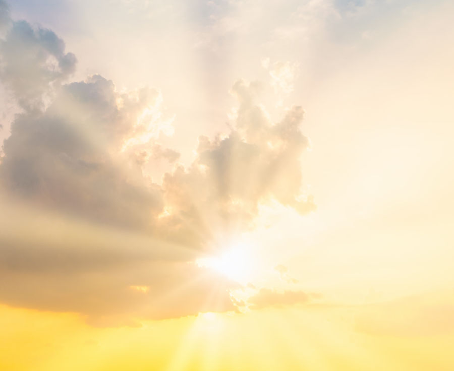 sun shining through clouds