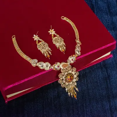 Gold-Toned Forming Necklace Set with Meenakari Floral Pendant