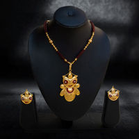 Traditional Gold-Plated Lord Jagannath Pendant with Maroon Beads thumbnail 1
