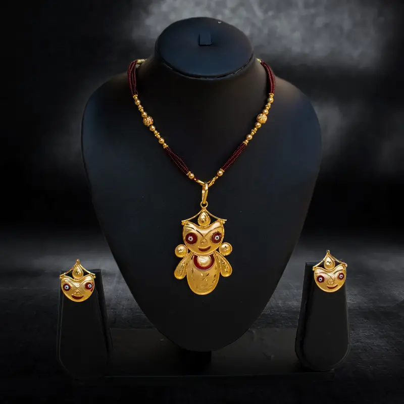 Traditional Gold-Plated Lord Jagannath Pendant with Maroon Beads - View 1