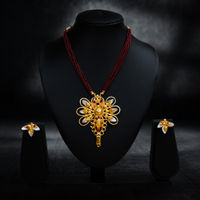 Statement Abstract Floral Beaded Necklace Set with Shell Accents thumbnail 1