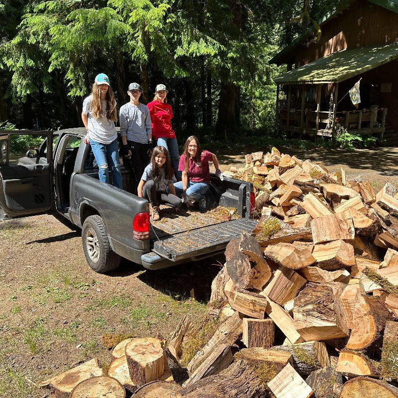 Youth Group Volunteers - Cutting up trees for fire wood