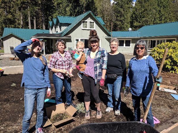 Team of volunteers sprucing up the grounds.