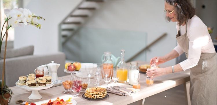 Sarabeth setting the table