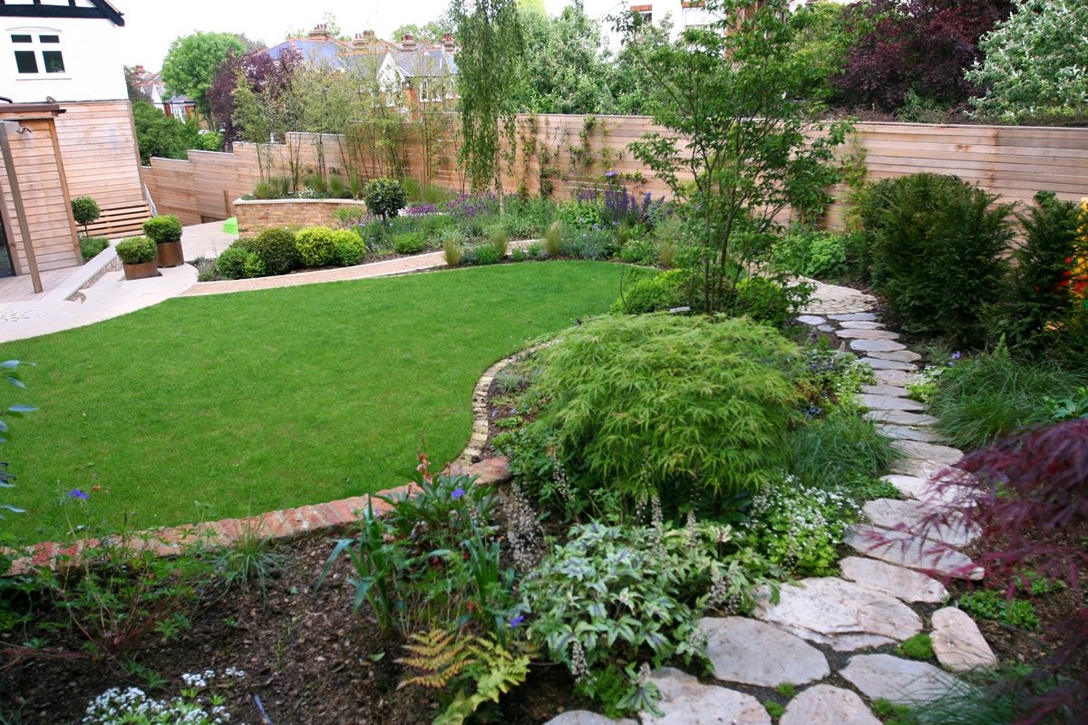 Family Garden giving space and tranquillity in Muswell Hill with slate