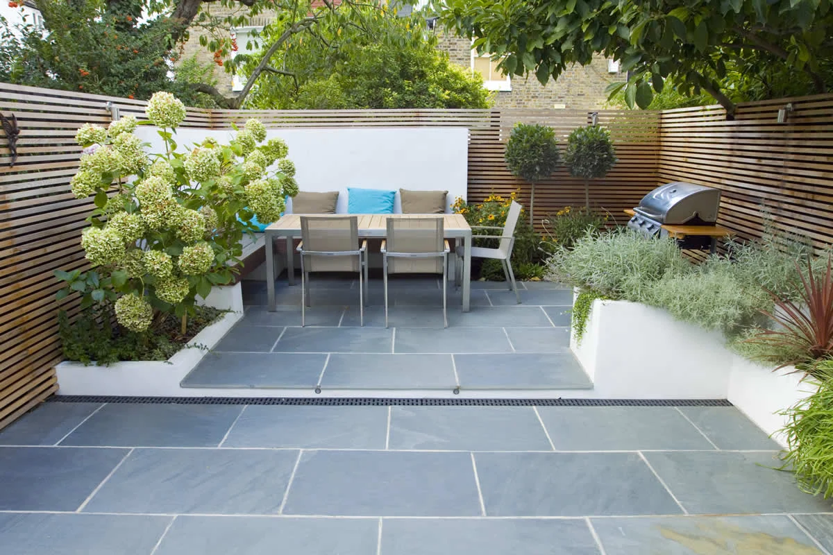 Contemporary small family garden designers in Clapham SW4 slate paving