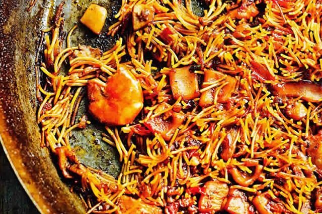 Fideuà Paella Pasta Seafood Recipe Spanish Tapas Restaurant, Heat about one-third of the olive oil in a wide frying pan over a medium heat.