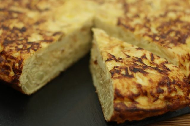 Tortilla de patatas Recipe Spanish Tapas Bars Restaurant, To make tortilla place a non-stick pan over medium heat drizzle a drop of olive oil.