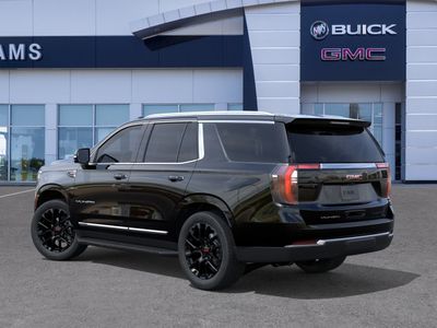 2026 GMC Yukon — rear three-quarter view