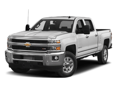 2018 Chevrolet Silverado 3500 HD LTZ in Summit White — front three-quarter view