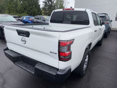 2026 Nissan Frontier — rear three-quarter view
