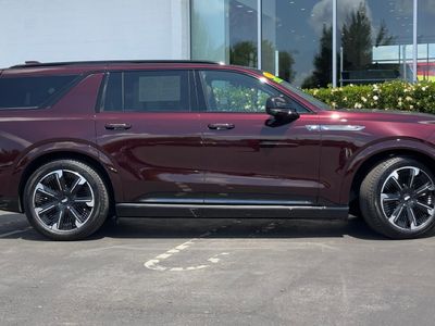 2026 Cadillac ESCALADE IQL — rear three-quarter view