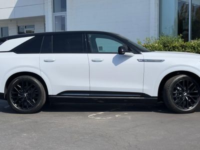 2026 Cadillac ESCALADE IQ — rear three-quarter view