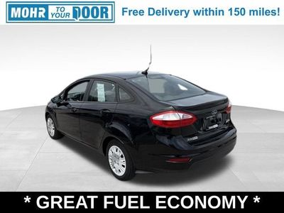 2016 Ford Fiesta — rear three-quarter view