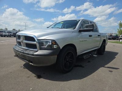 2011 RAM 1500 — side profile view