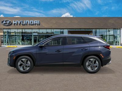 2026 Hyundai TUCSON HYBRID — rear three-quarter view