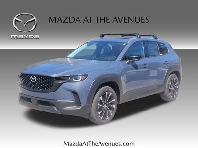 2026 Mazda CX-50 Hybrid Premium Plus in Gray — front three-quarter view