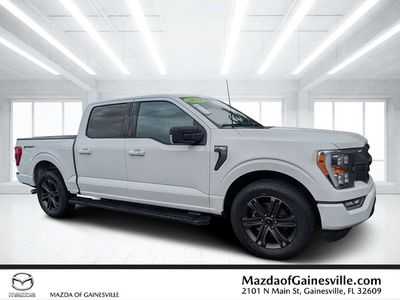 2023 Ford F-150 XLT in White — front three-quarter view