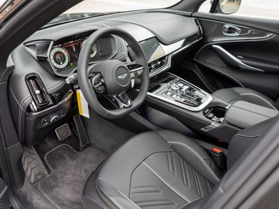 2026 Aston Martin DBX — rear three-quarter view