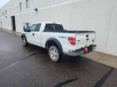 2009 Ford F-150 — rear three-quarter view