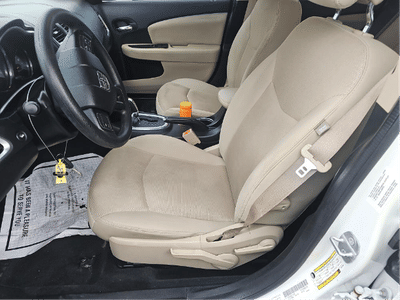 2014 Dodge Avenger — rear three-quarter view
