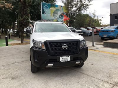 2023 Nissan FRONTIER — rear three-quarter view