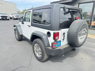 2013 Jeep Wrangler — rear three-quarter view