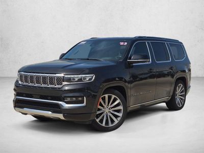 2023 Jeep Grand Wagoneer 4x4 in Ember Pearlcoat — front three-quarter view