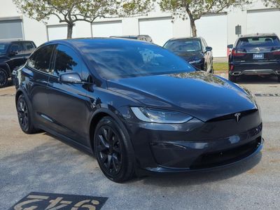2024 Tesla Model X — rear three-quarter view
