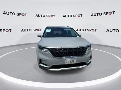 2023 Kia Carnival — rear three-quarter view