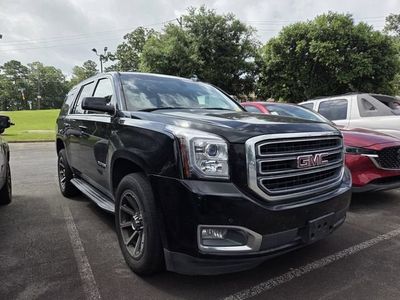 2017 GMC Yukon SLE in Onyx Black — front three-quarter view