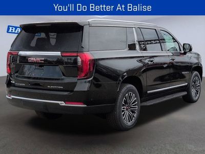 2026 GMC Yukon XL — rear three-quarter view