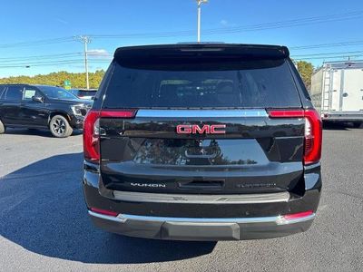 2026 GMC Yukon — rear three-quarter view